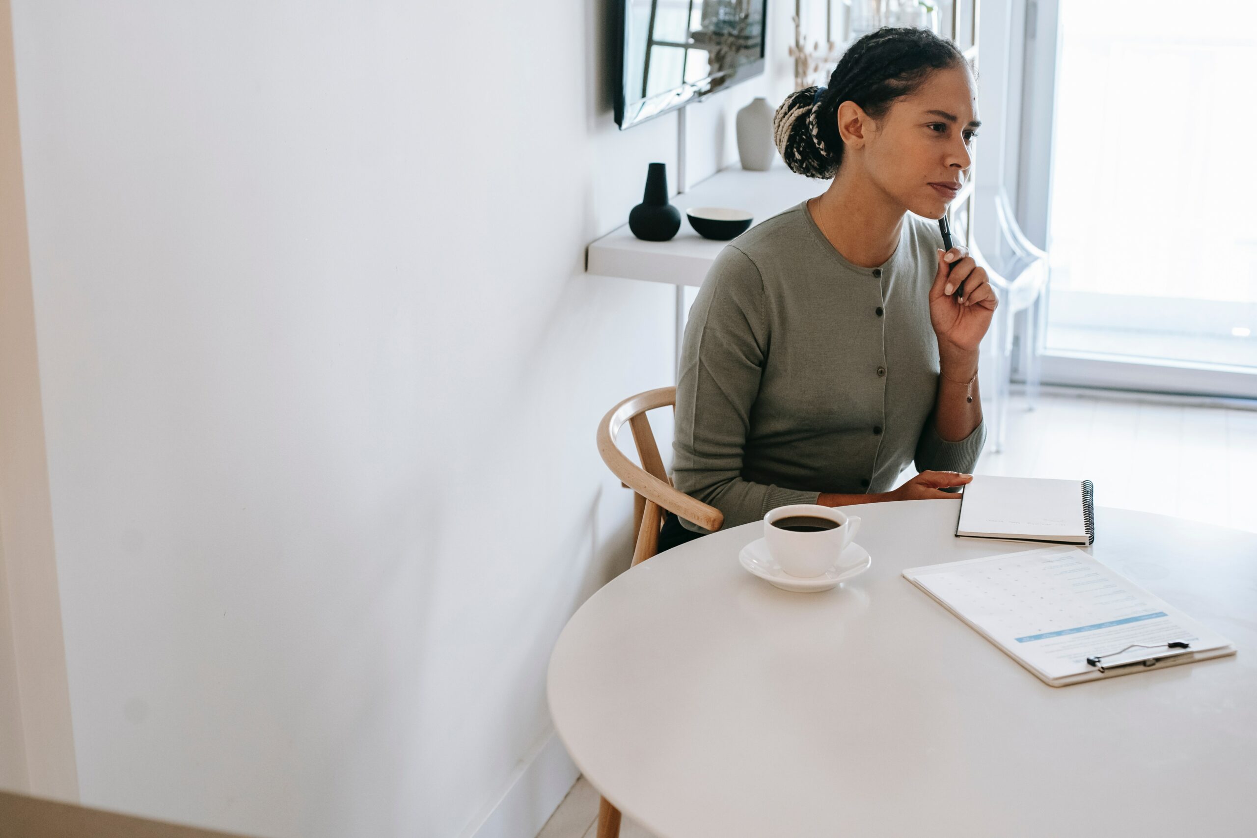 HR leader pausing to think through engagement survey notes before deciding next steps